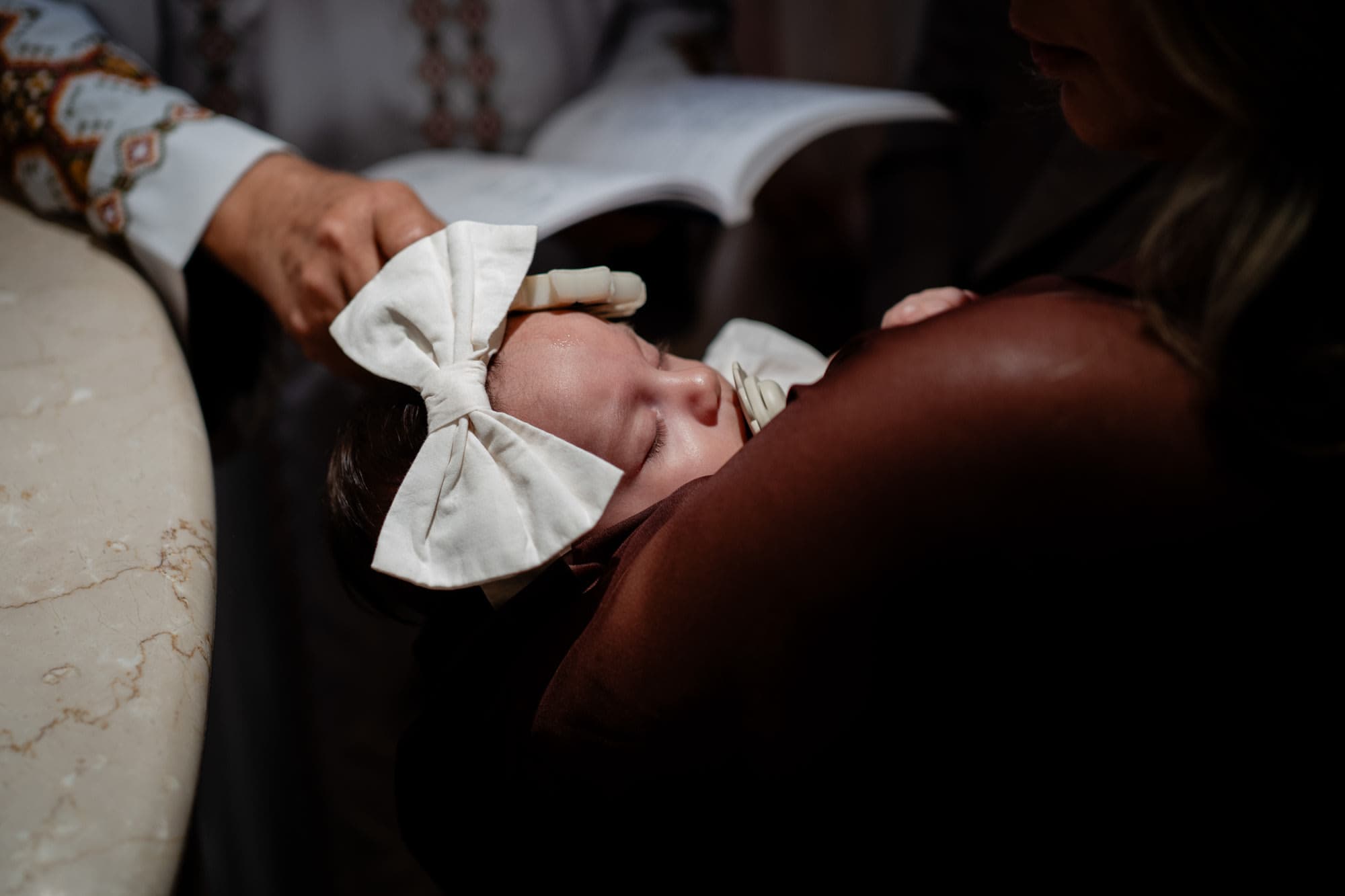 Family gathering at a Sydney baptism, natural candid moment