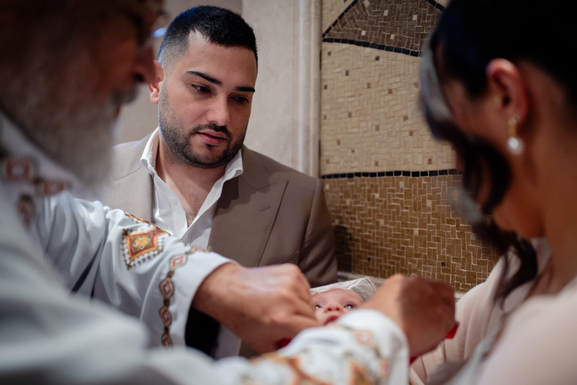 Family dressed for a baptism ceremony at a Sydney church